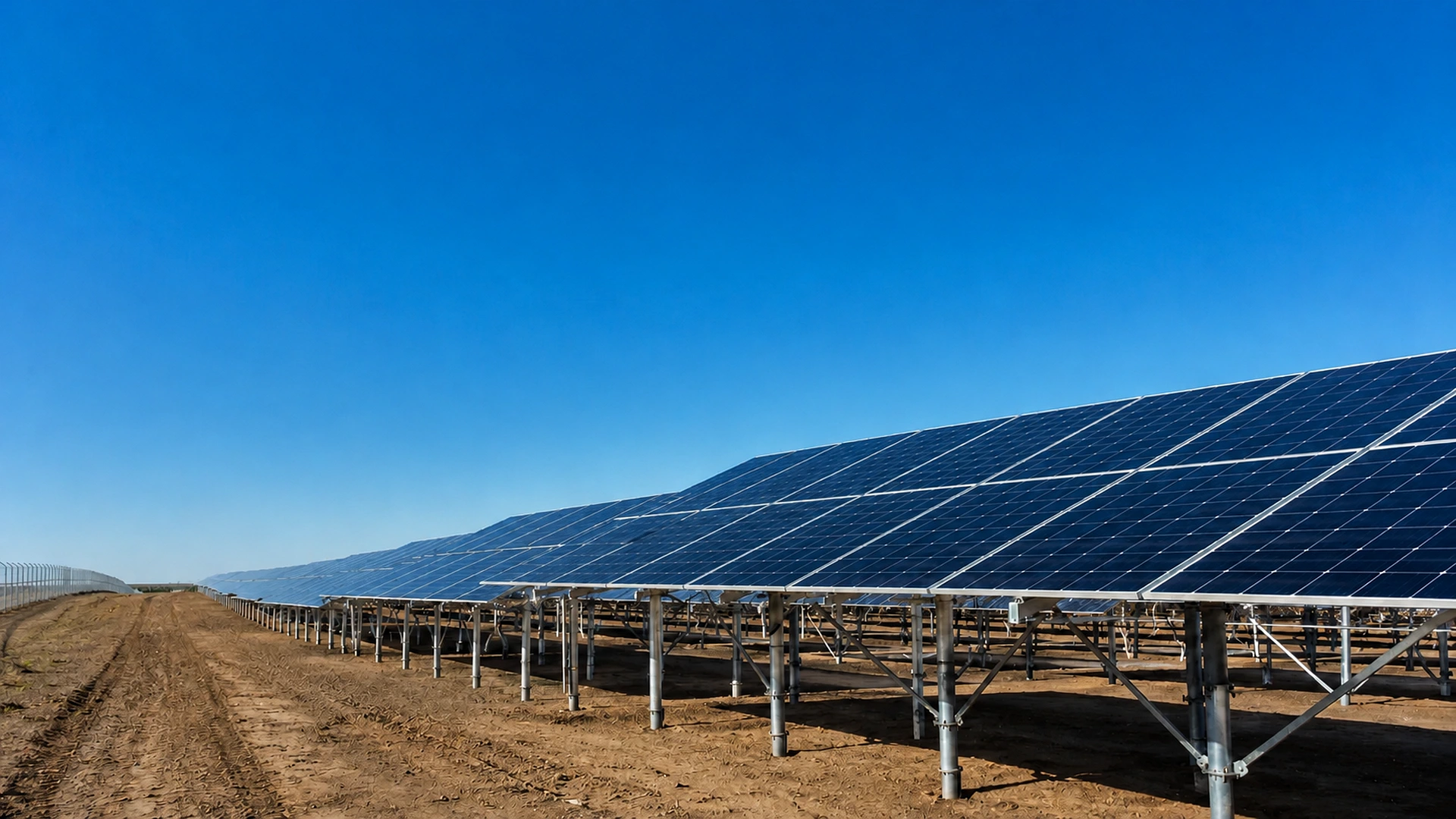 Home Ground-mounted photovoltaic support system across an open solar site